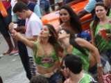 Brazilian girls taking a selfie on an iPhone during Carnaval 2014