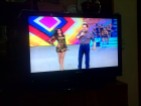 Brazilian family TV viewing featuring women in bikinis dancing erotically