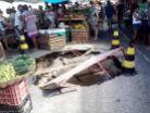 Massive pot-hole appears in a market in Brazil