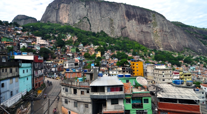 Cliff-top view of South America’s largest favela Rocinha from “Dois Irmaos” in Rio de Janeiro